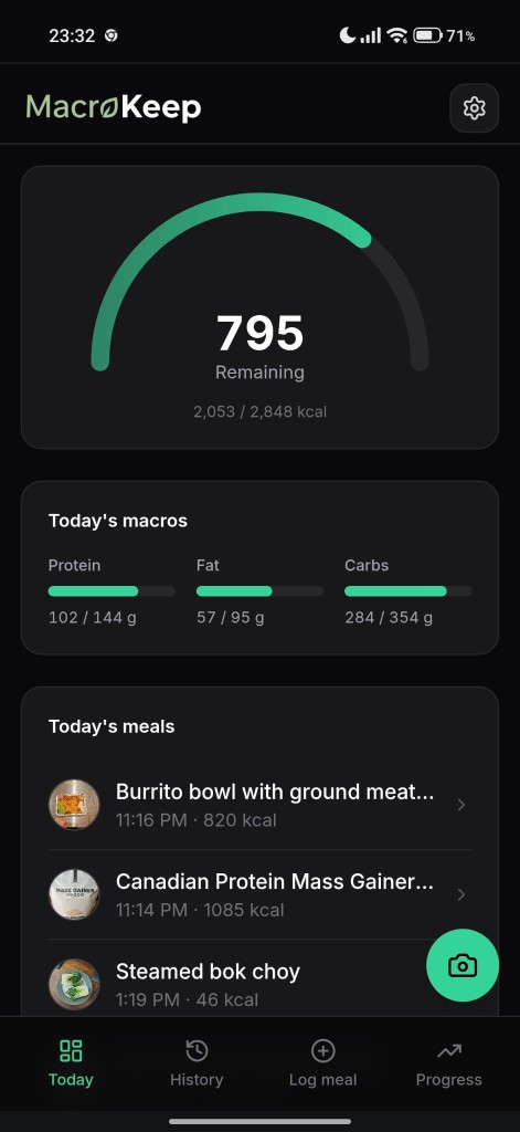 Today screen with calorie ring, macro bars, and meals